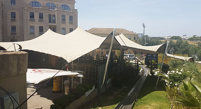 Cover over queuing area at the track