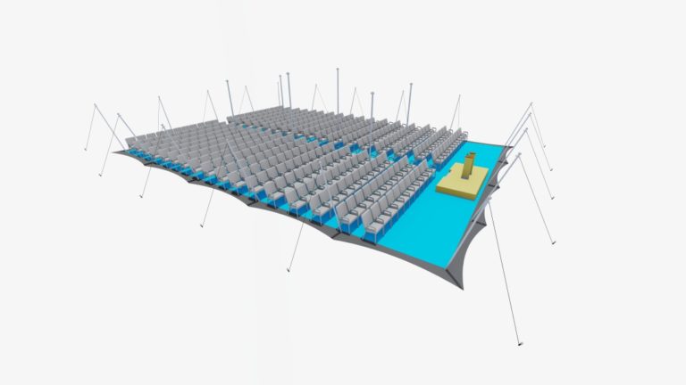 Agencement d'une grande verrière flottante « tente stretch » de 21 m x 15 m, avec des rangées de sièges de type cinéma