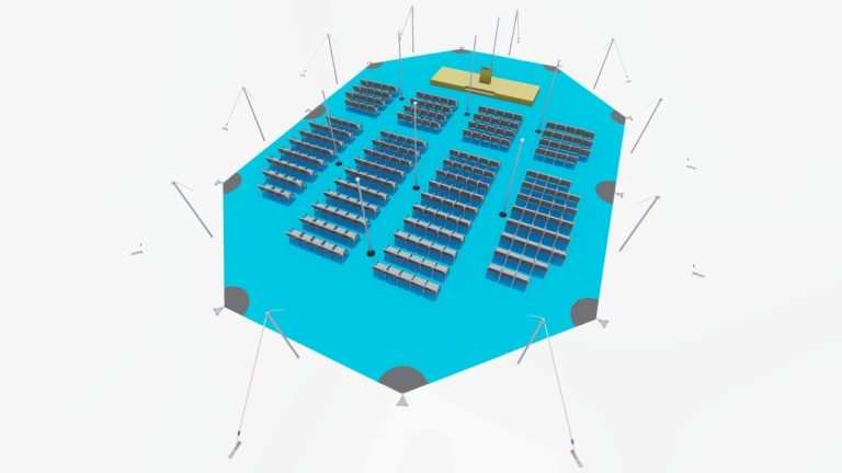 Vue d'ensemble de l'Arachnid extensible RHI, aménagée avec des sièges disposés en gradins, face à une scène de présentation