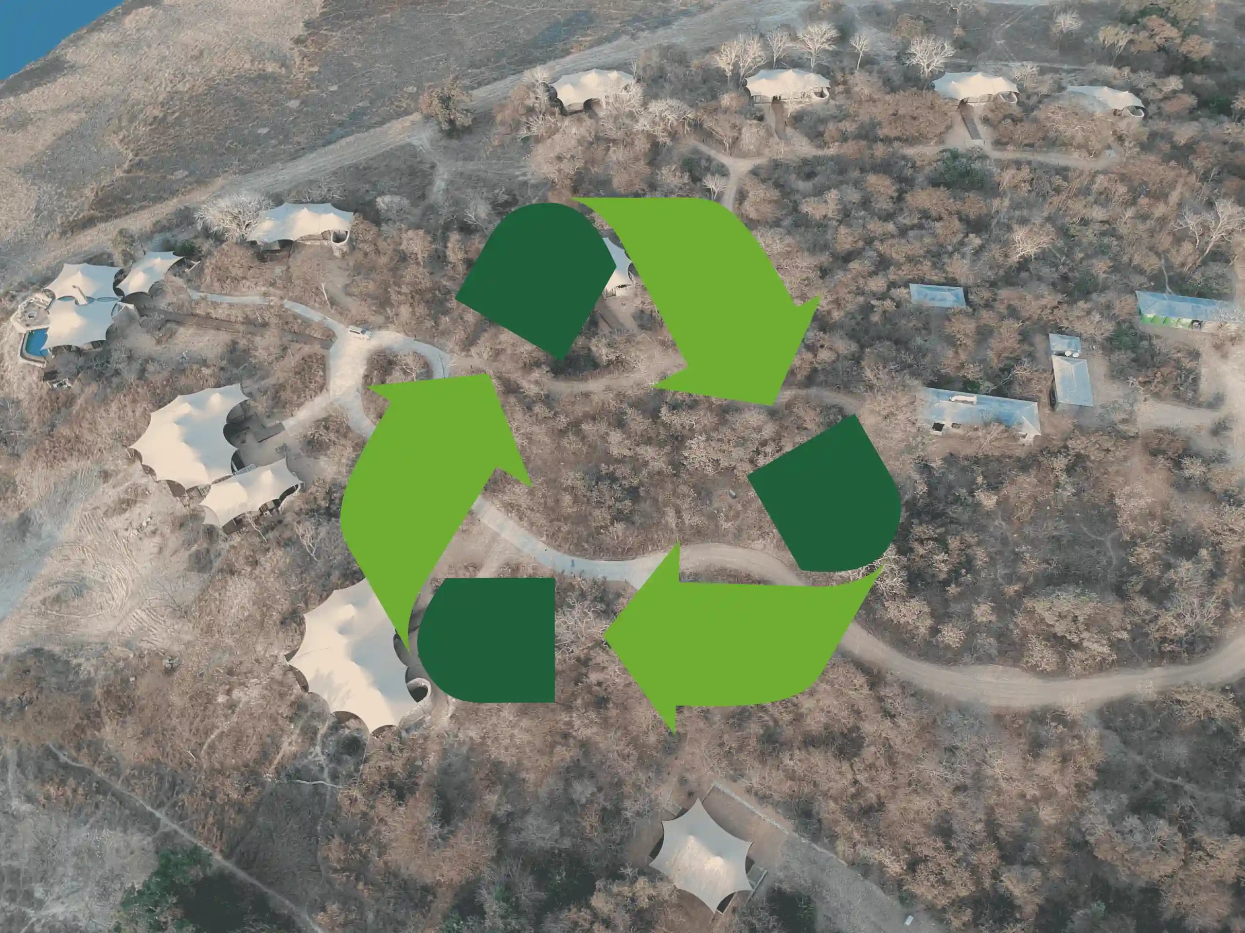 Aerial landscape with a recycling symbol representing RHI's environmental responsibility