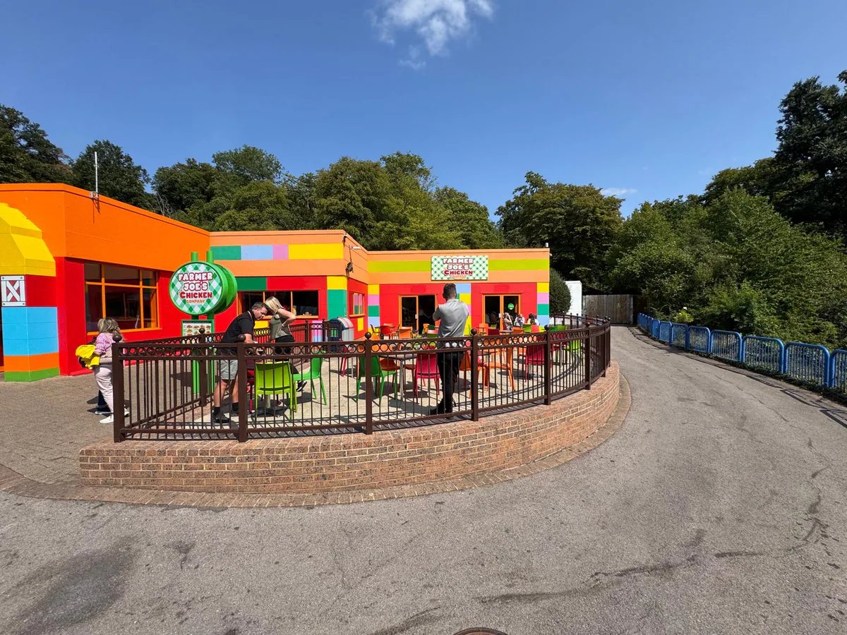 Outdoor attraction site before installation of a custom stretch tent