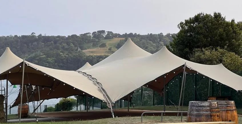 Chino stretch tents joined by an integrated gutter