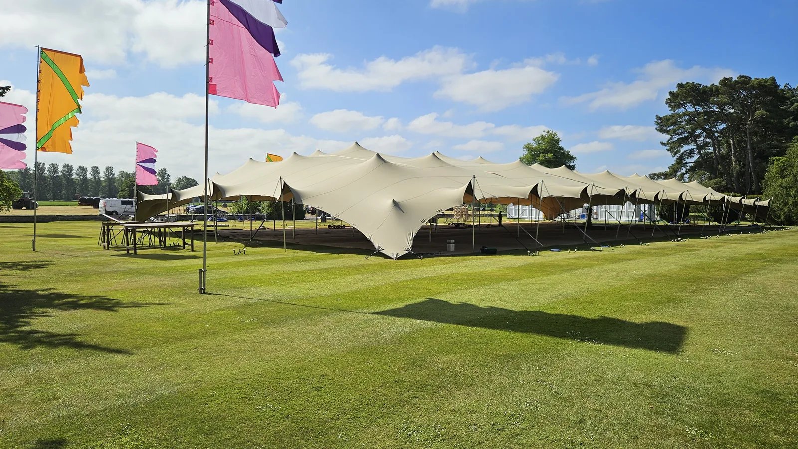 Large linked stretch tents on the lawn at a Dublin event