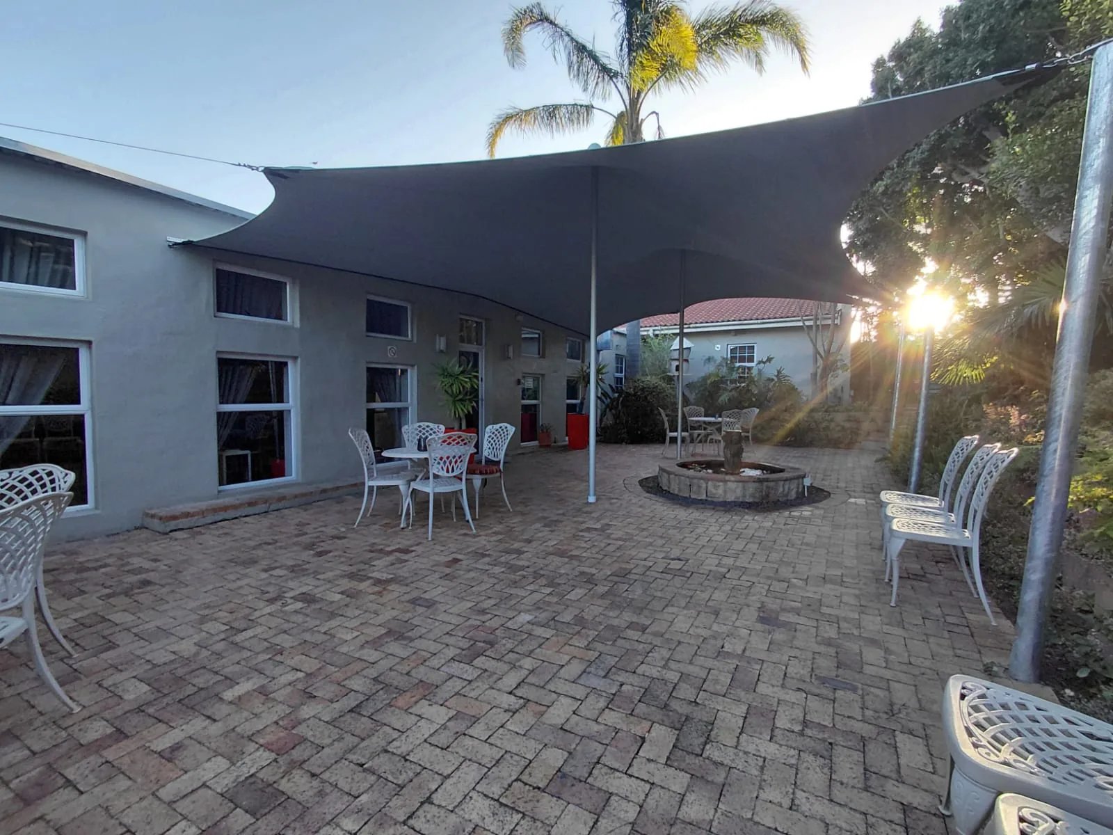 Custom shade canopy over a private residential courtyard