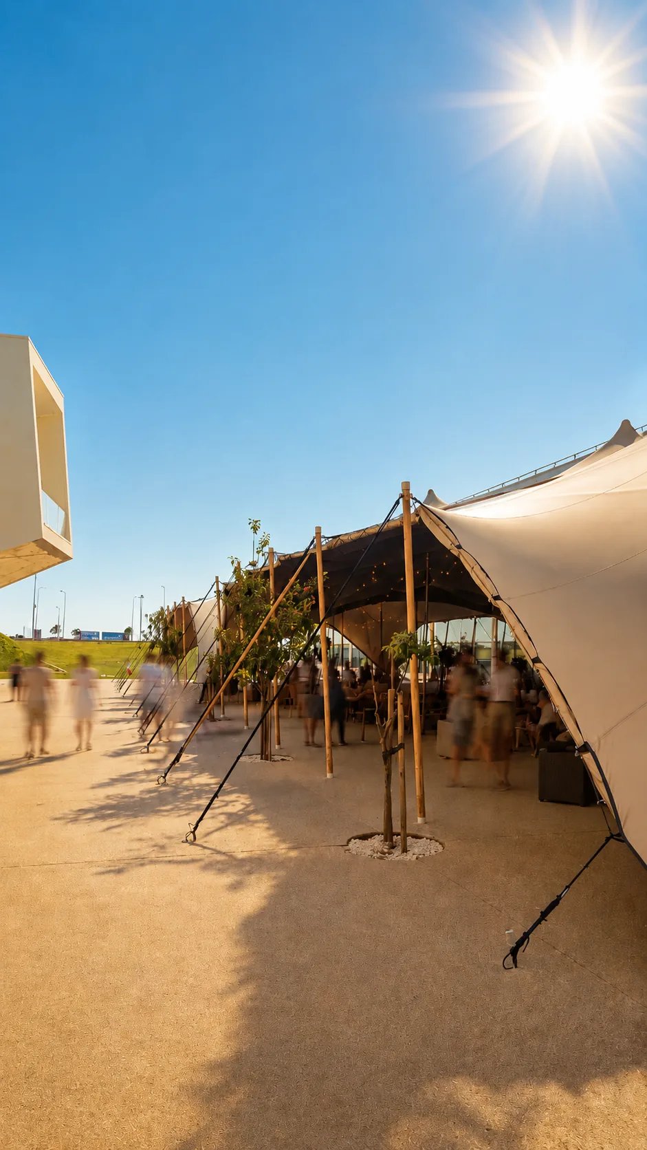 Illustrated beige stretch tent entrance with walling and outdoor seating in bright sunshine