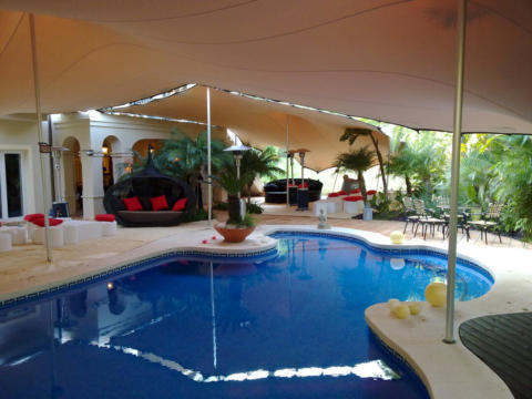 STRETCH TENTS LINKED &  ATTACHED TO BUILDINGS CHINO